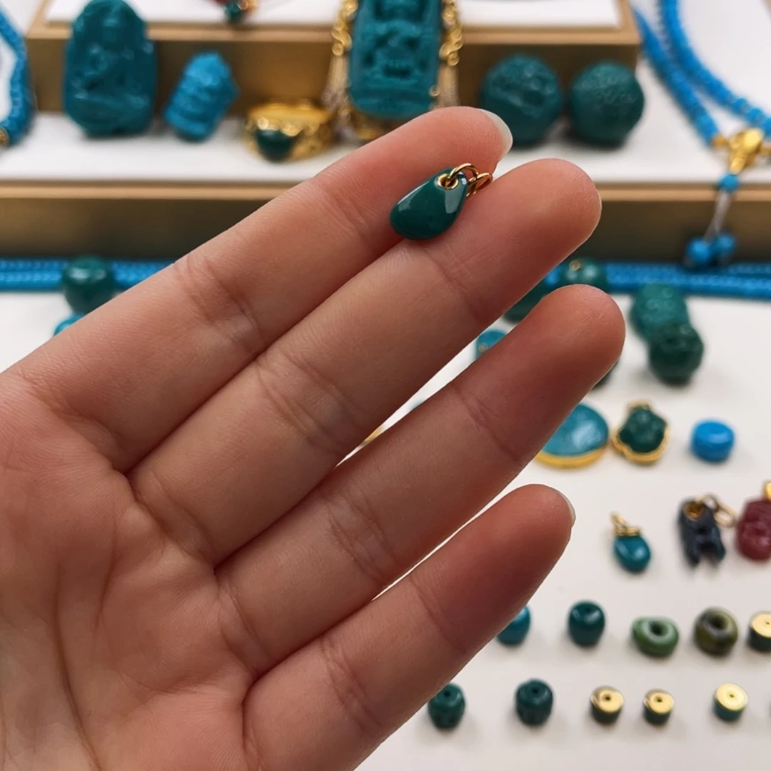 我***了绿松石未镶嵌把件