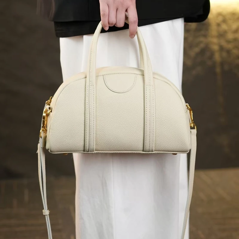 2025新款真皮大容量休闲女包半圆包放雨伞纯牛皮斜挎手提包女百搭