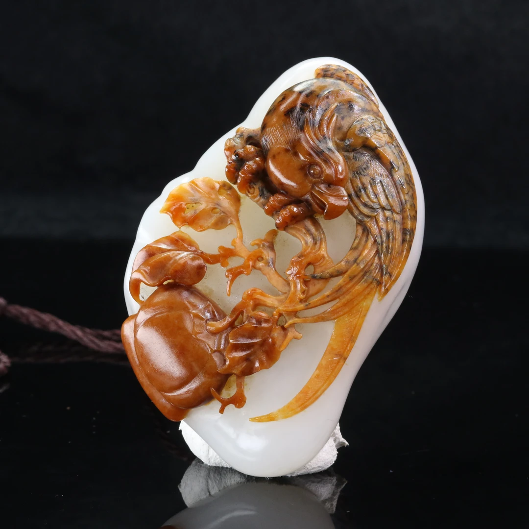 48和田玉聚红皮英明神武吊坠/100621北京中保拍卖