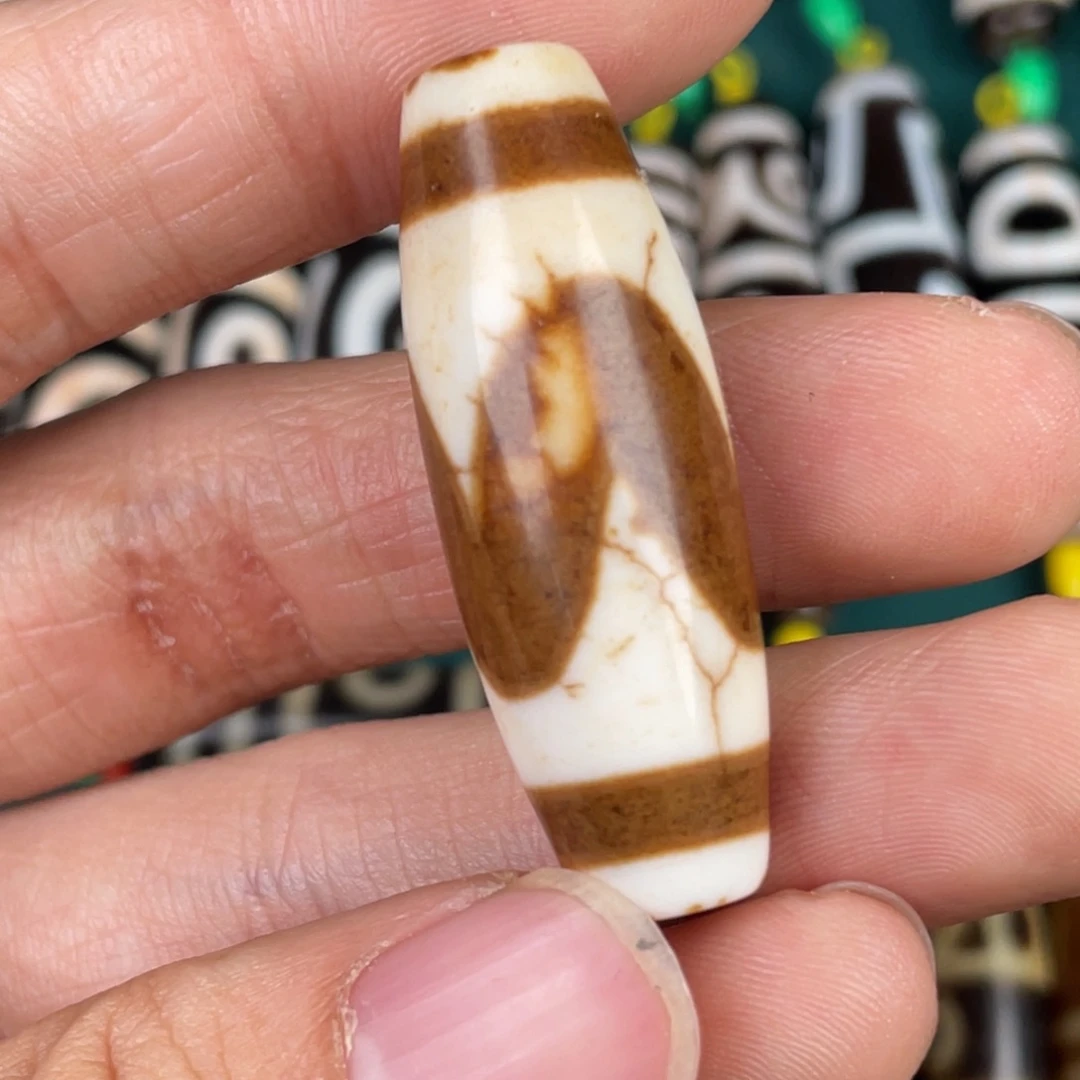 玛瑙/玉髓裸珠虎牙