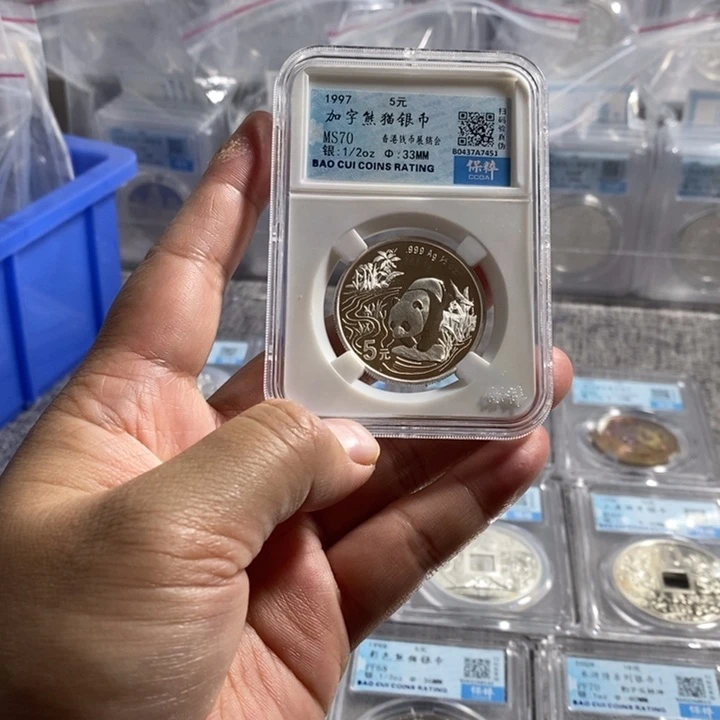 纯银评级70分1997年香港钱币展销会加字猫无盒证