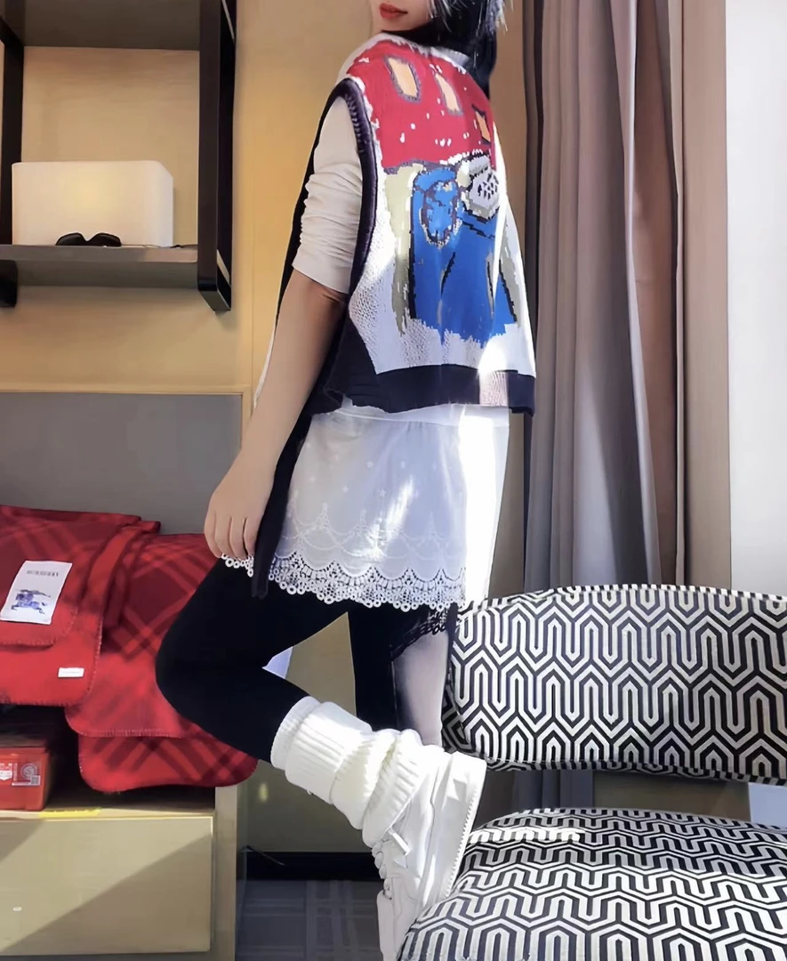 哝NONG-2025年早春新款百大红人上新涂鸦针织提花披肩0692309