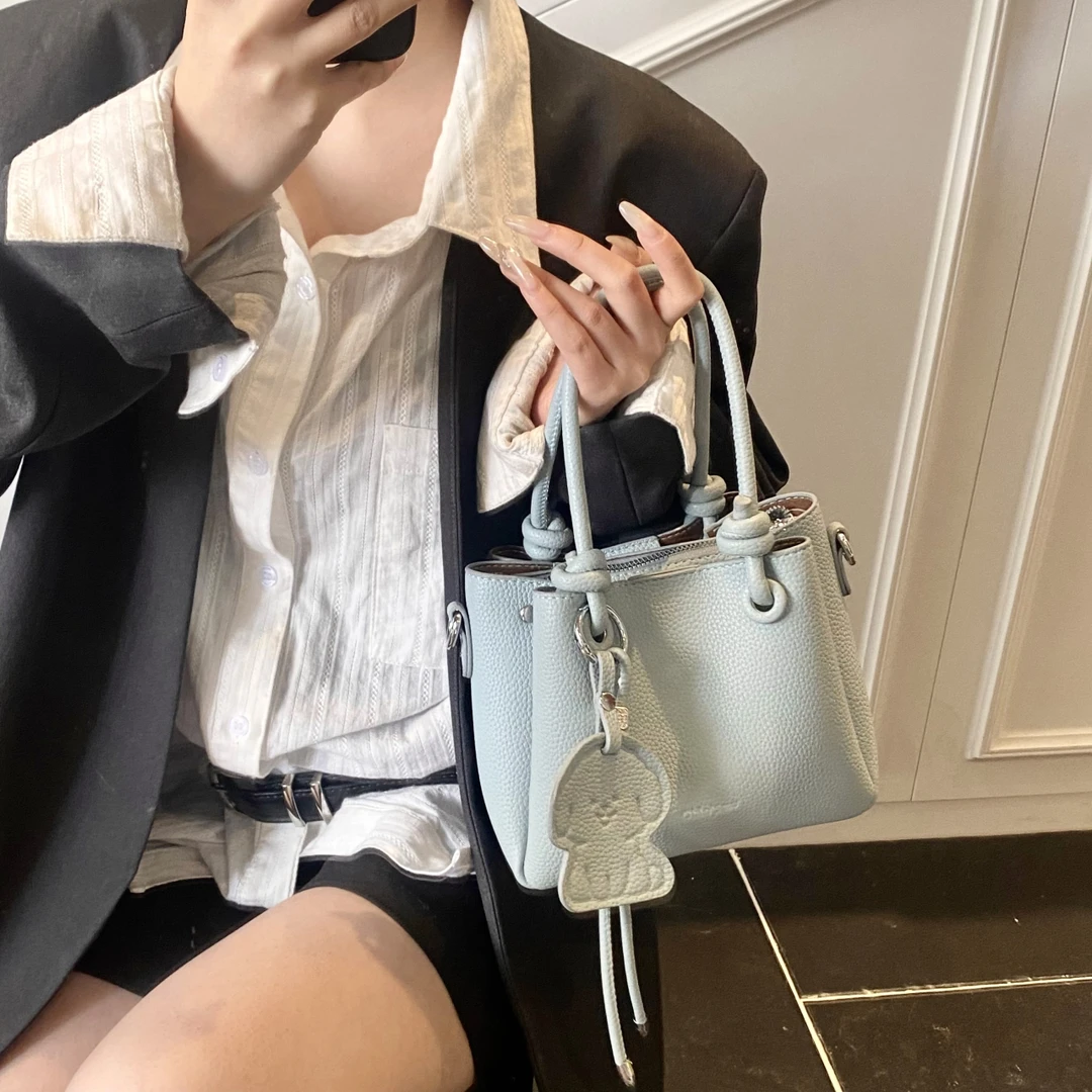 春夏新款小菜篮手提包高级感牛皮纹理斜跨包时尚百搭水桶包1351蓝