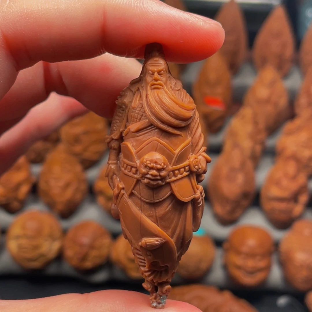 橄榄核吊坠纯手工雕刻