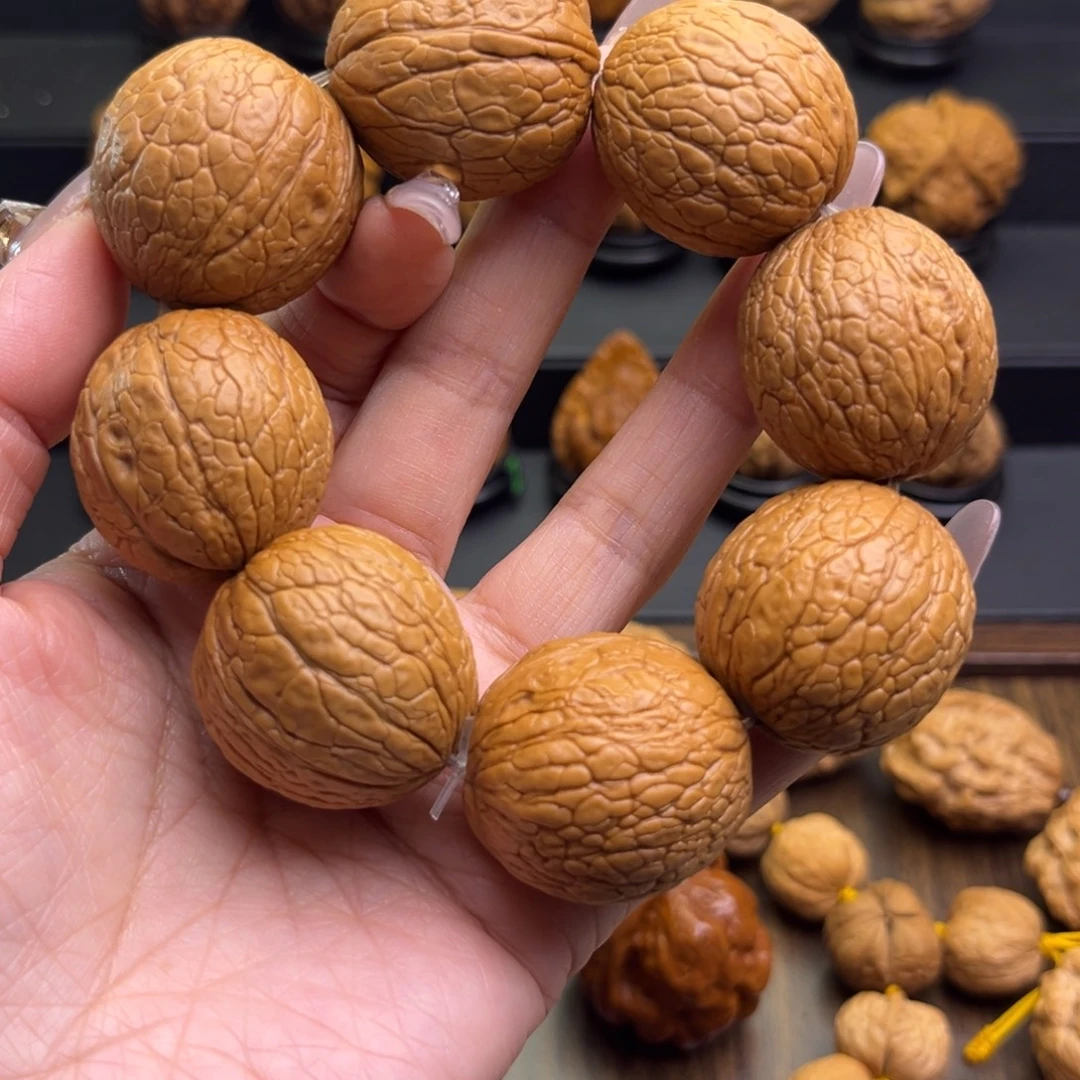 文玩核桃把件蛇皮球