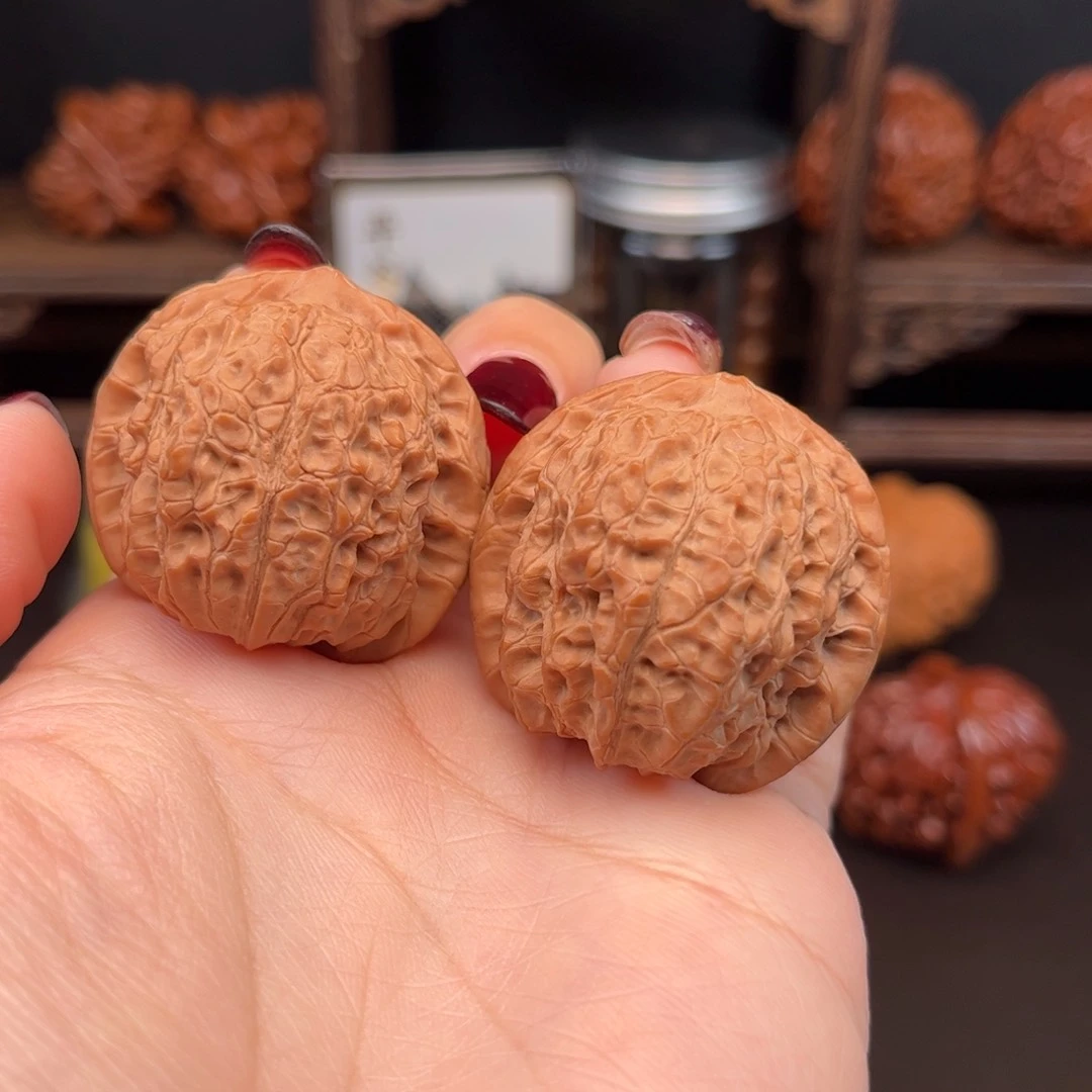 桃核把件平谷野生原树血麒麟