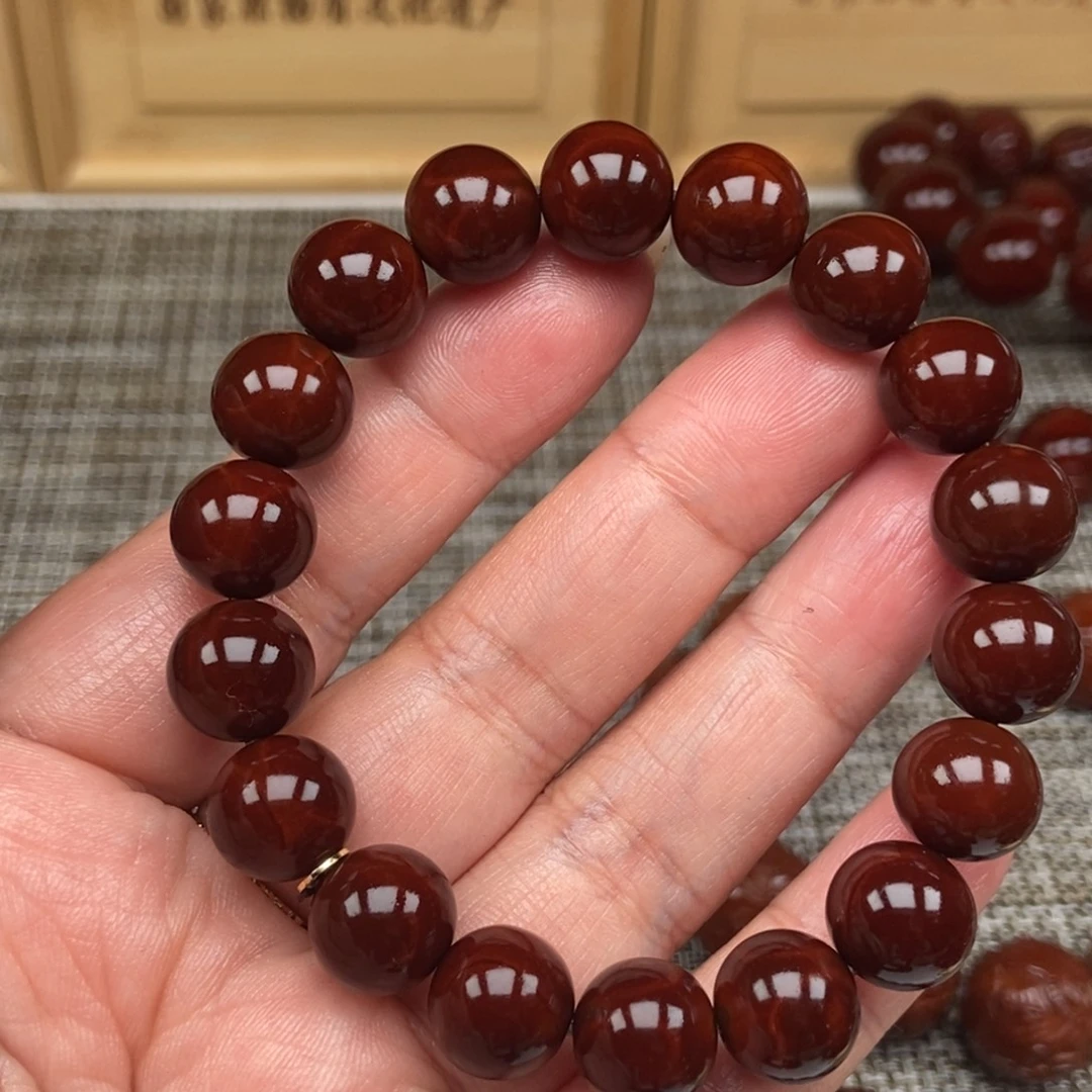 吴***辉橄榄核吊坠光珠12