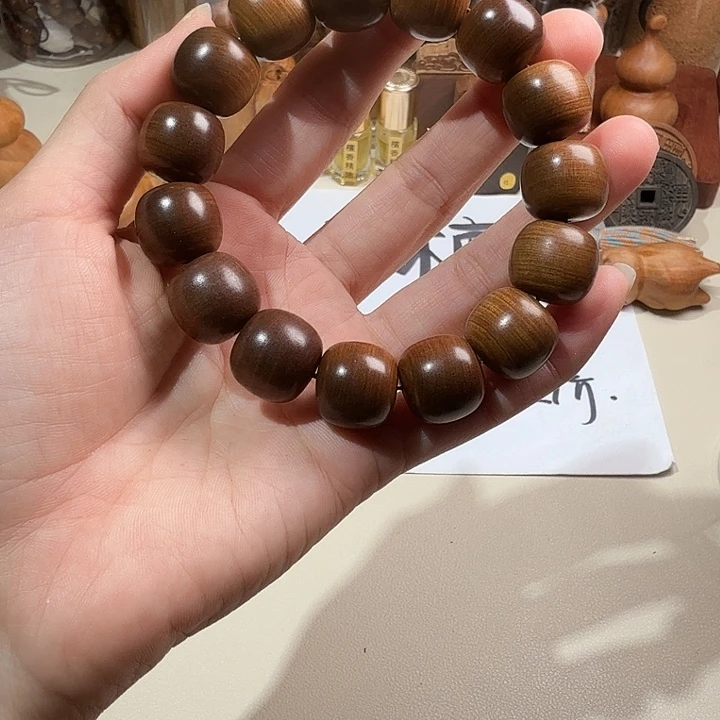 淡***然檀香木印度迈索尔老山檀香黑金15/16横纹沉水