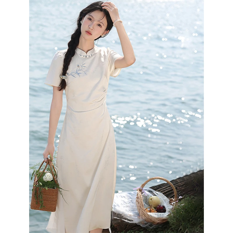 新中式杏色印花立领短袖连衣裙女夏季新款国风收腰显瘦气质长裙子