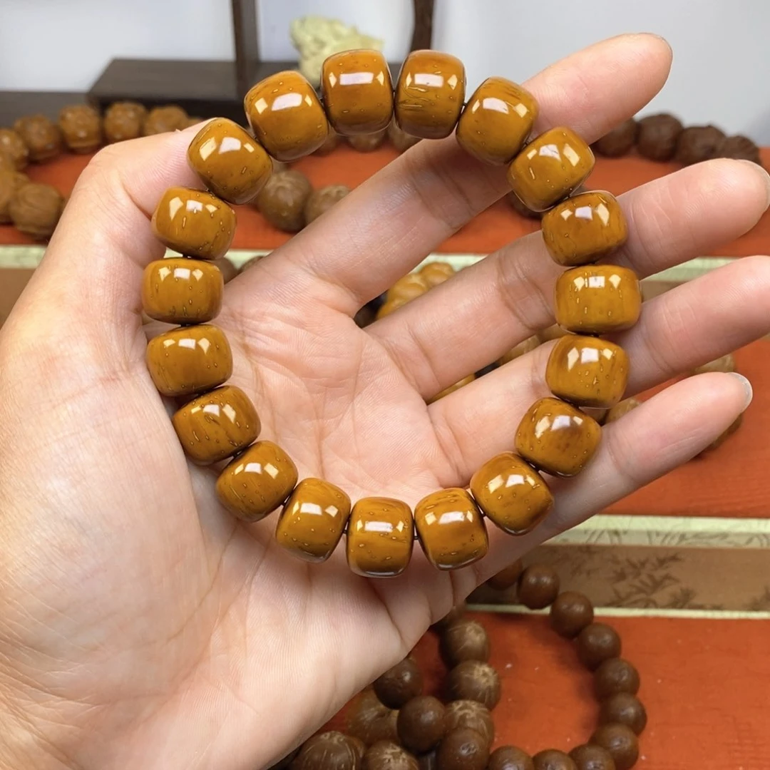 紫金鼠手串15黄皮桶珠