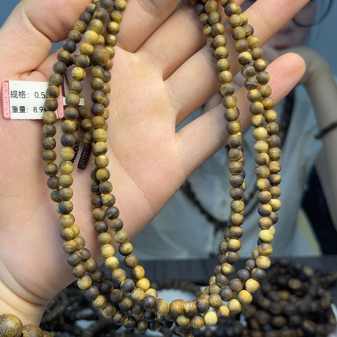 沉香碎屑+卡5虎斑纹花珠9克+