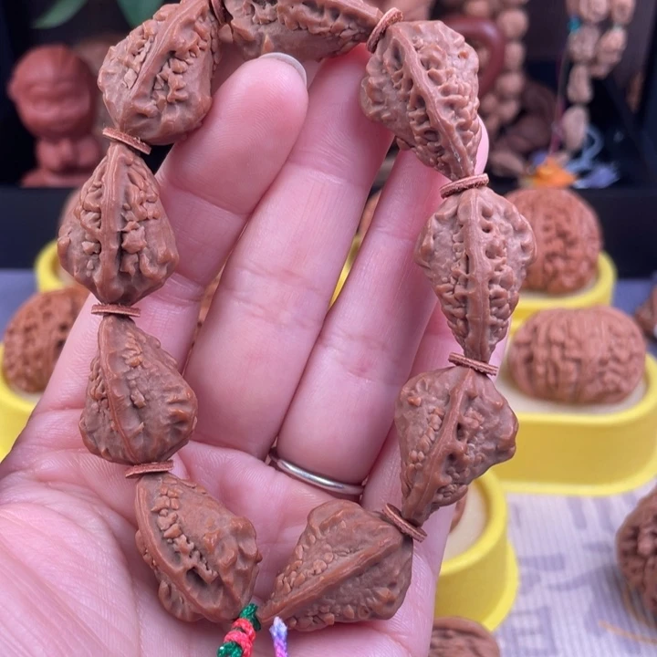 吊坠文玩核桃麒麟角手串