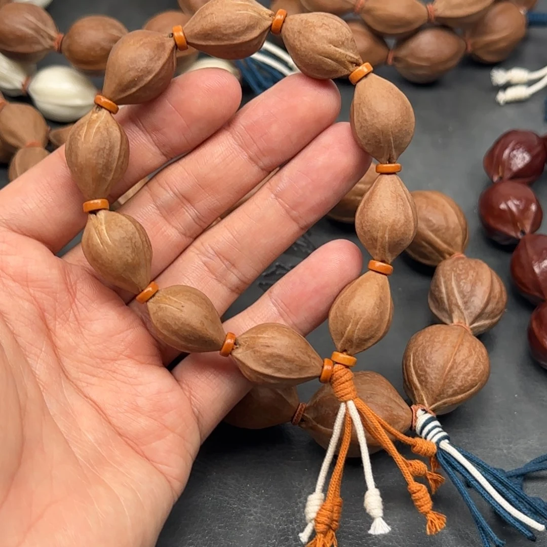 ⁹***⁷橄榄核手串1.5✖️2.3三面佛头货