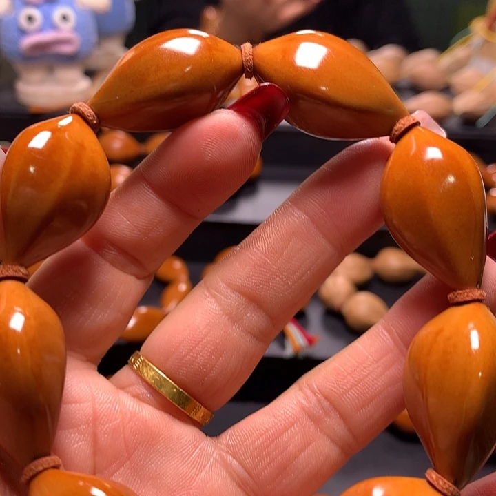 人***。橄榄核手串/手链三花手串