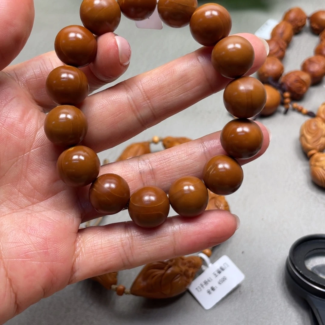 橄榄核吊坠简***好铁核光珠