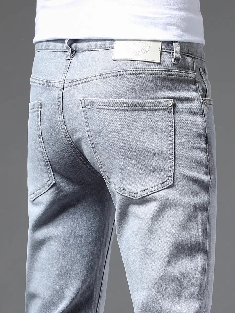 凯邦威百搭休闲牛仔裤秋季弹力高端天丝冰丝男裤直筒潮牌欧货裤子