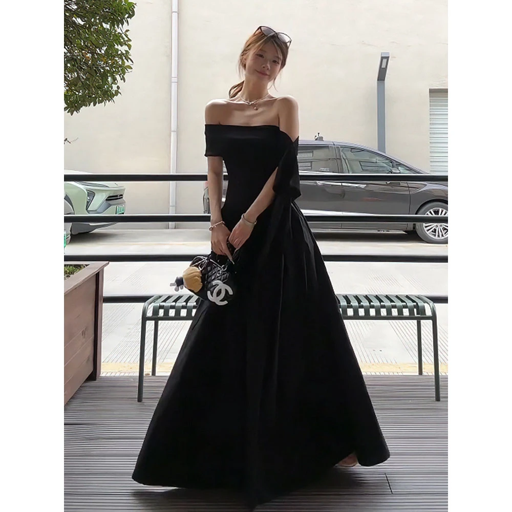 法式赫本风一字肩飘带大裙摆黑色连衣裙女夏季显瘦气质御姐长裙