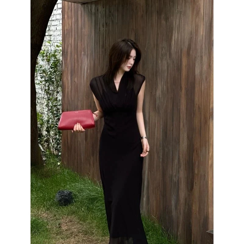 法式赫本风气质显瘦连衣裙女2025夏季新款设计感网纱拼接收腰长裙