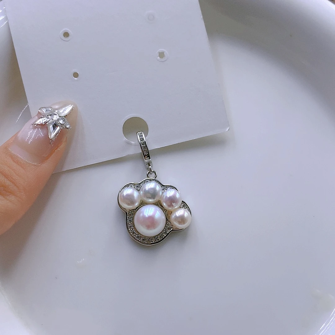 银S925镶嵌耳饰淡水珍珠开*?