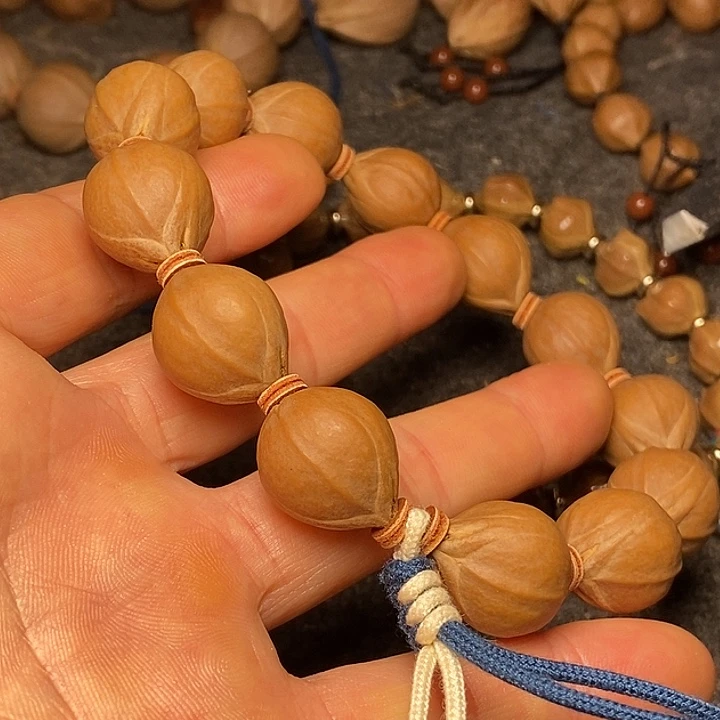 手串橄榄核1.6铁核3号