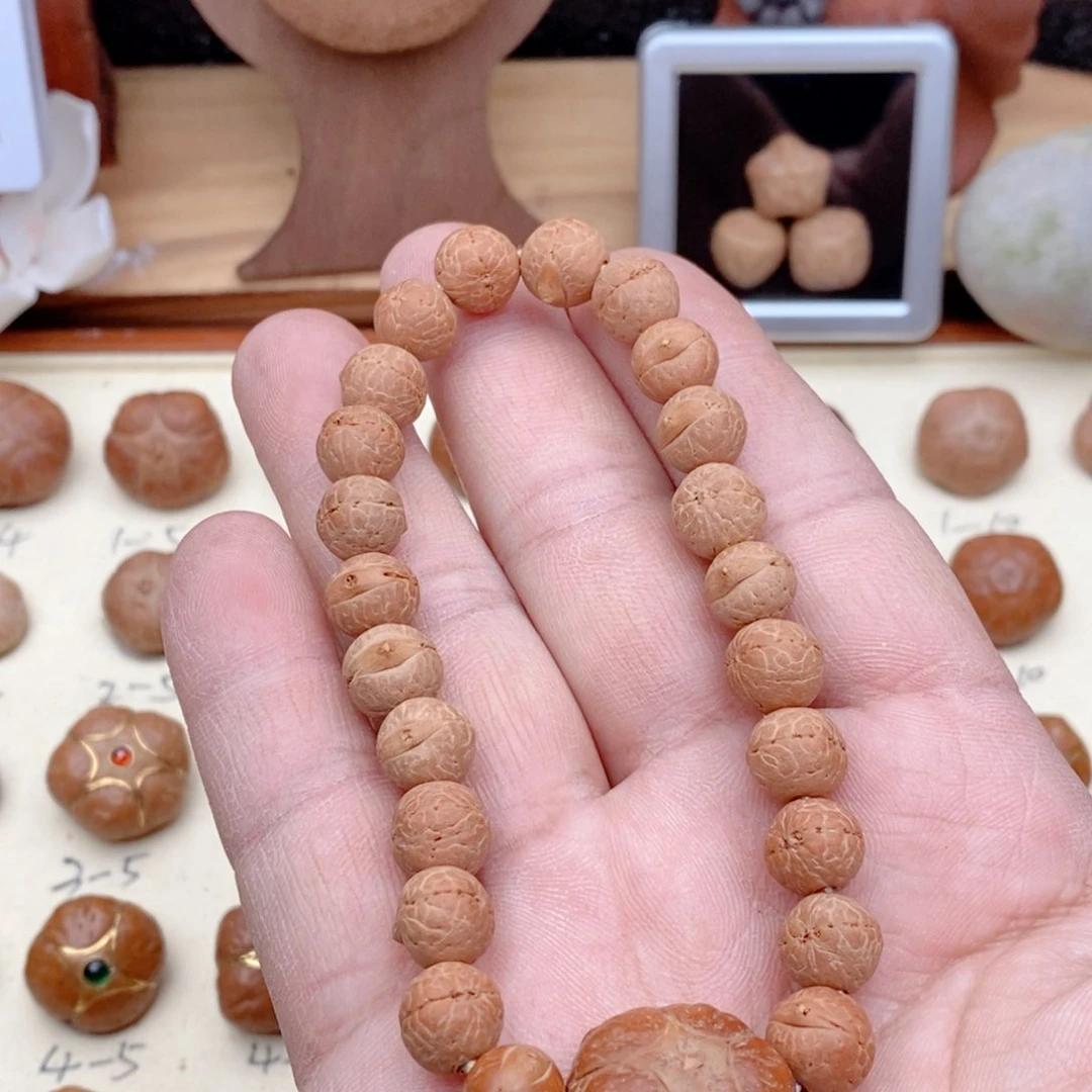 龙眼菩提吊坠向***路手串