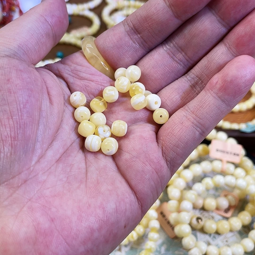 蜜蜡未镶嵌手串7mm2颗一对微瑕
