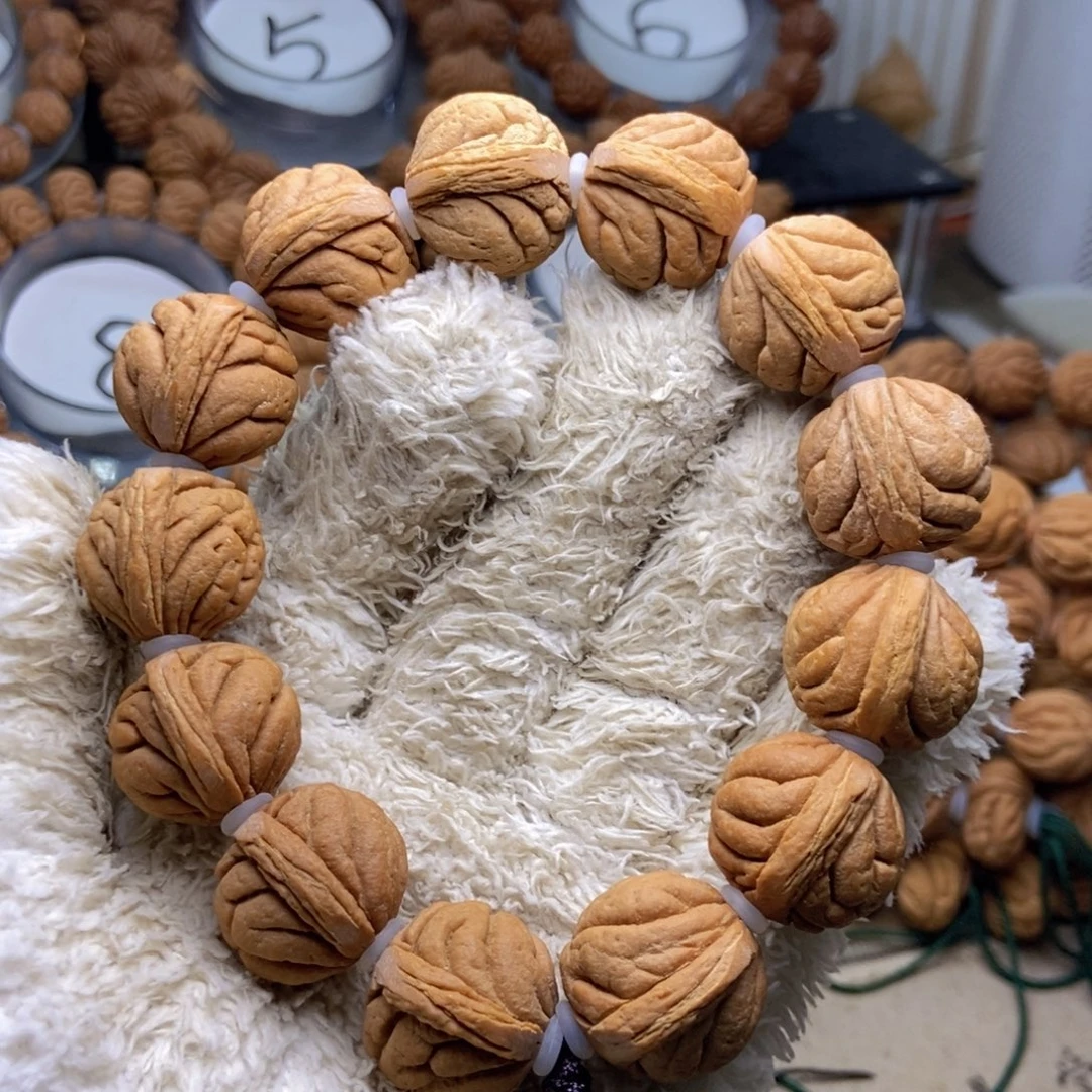 阿***飞手串桃核闪电购 69