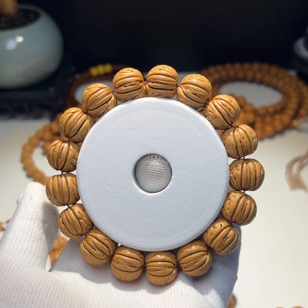 桃核手串尘***.金丹桃核手串