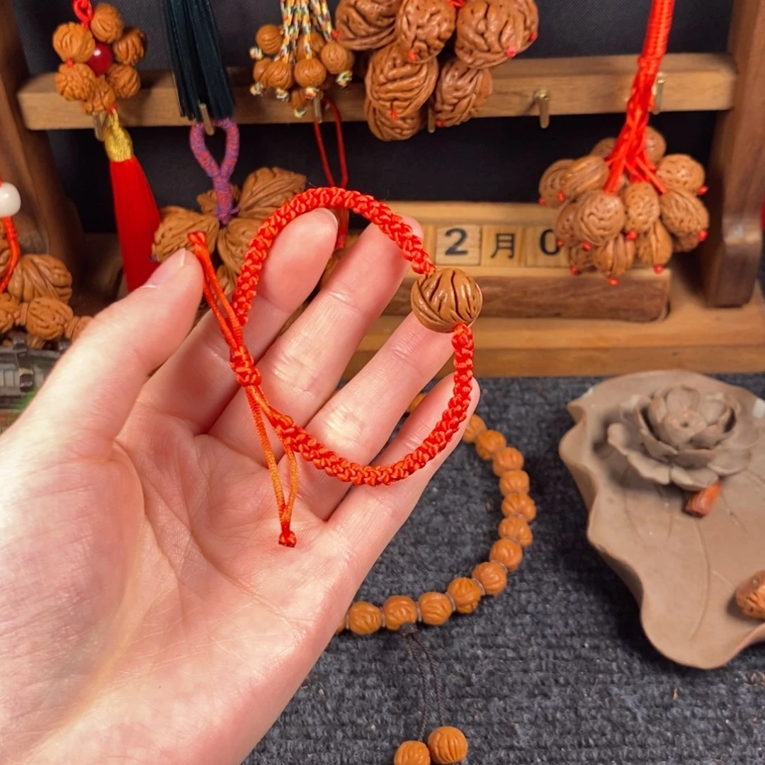 吊坠桃核桃枭手串