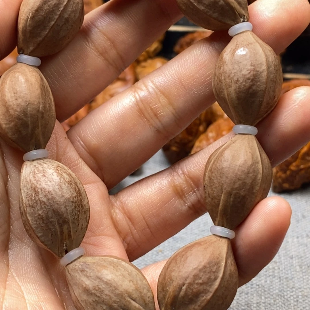 橄榄核手串/手链华****心素核手串