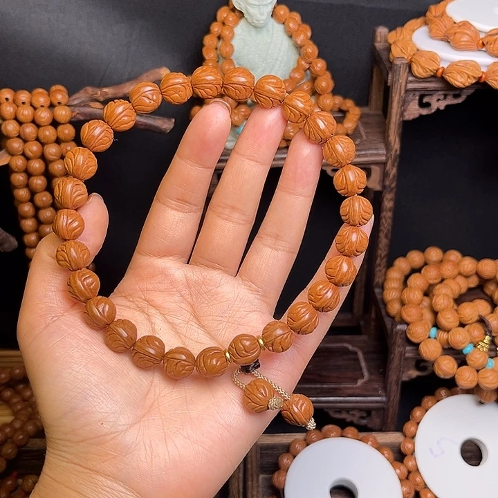 吊坠桃核双脊龙手持