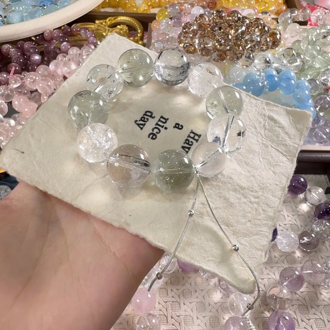 ****军未镶嵌手链水晶绿多宝