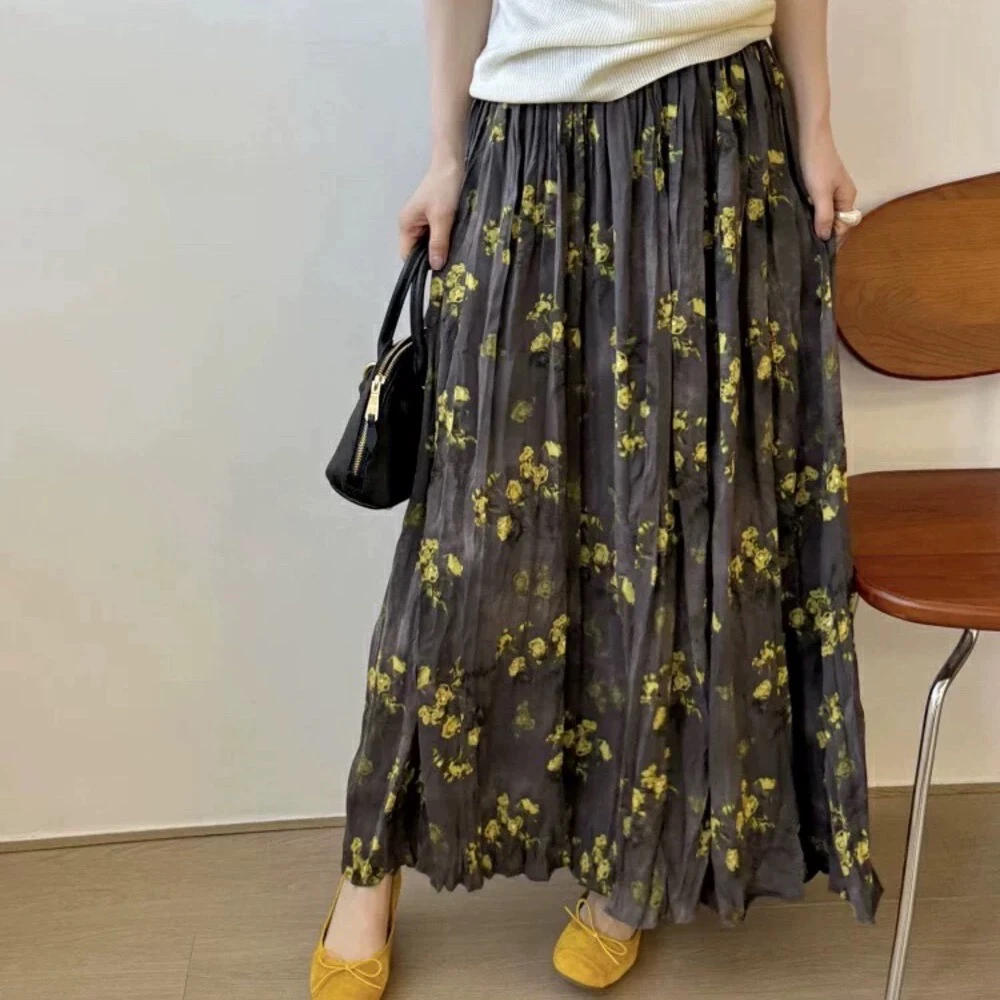 高级气质半身连衣裙女2025夏季新款时尚印花宽松设计感开叉A字裙