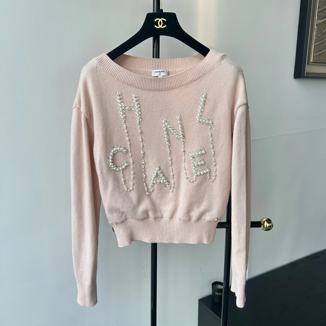 99新 Chanel/香奈儿 21S粉色珍珠水钻刺绣字母流苏串珠毛衣34码
