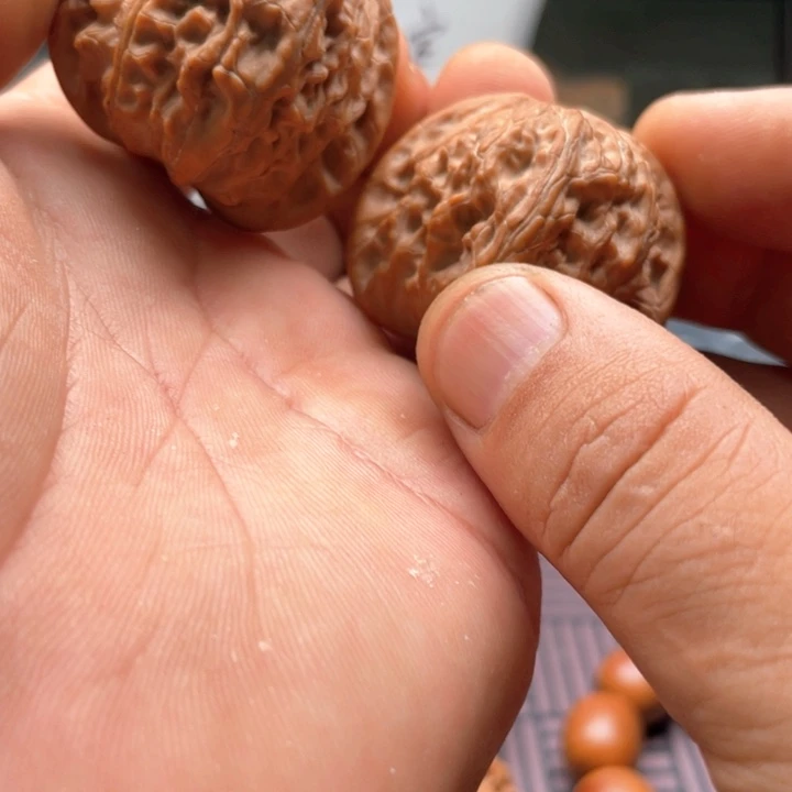 文玩核桃把件红皮磨盘