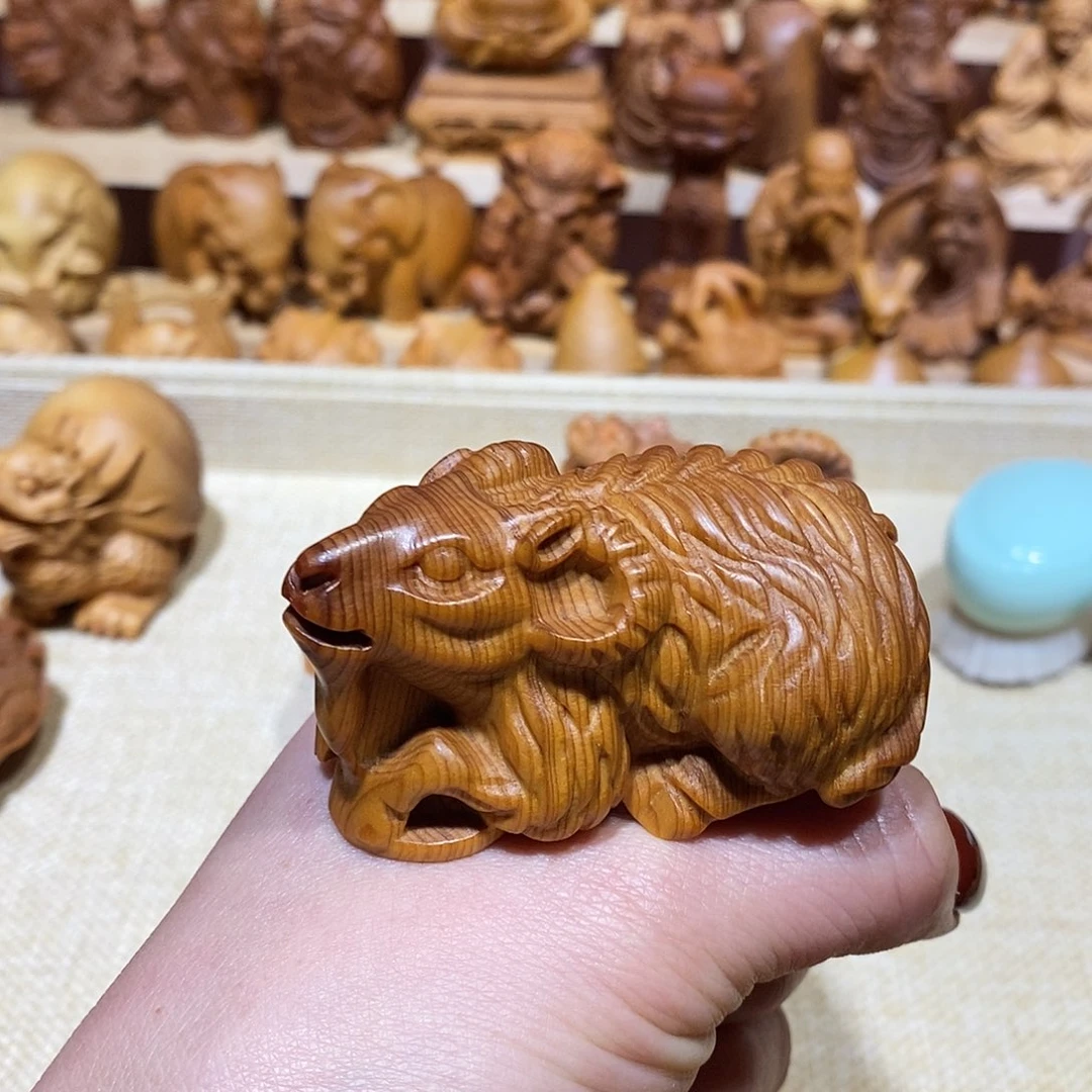 木悻****轮崖柏手把件，山羊