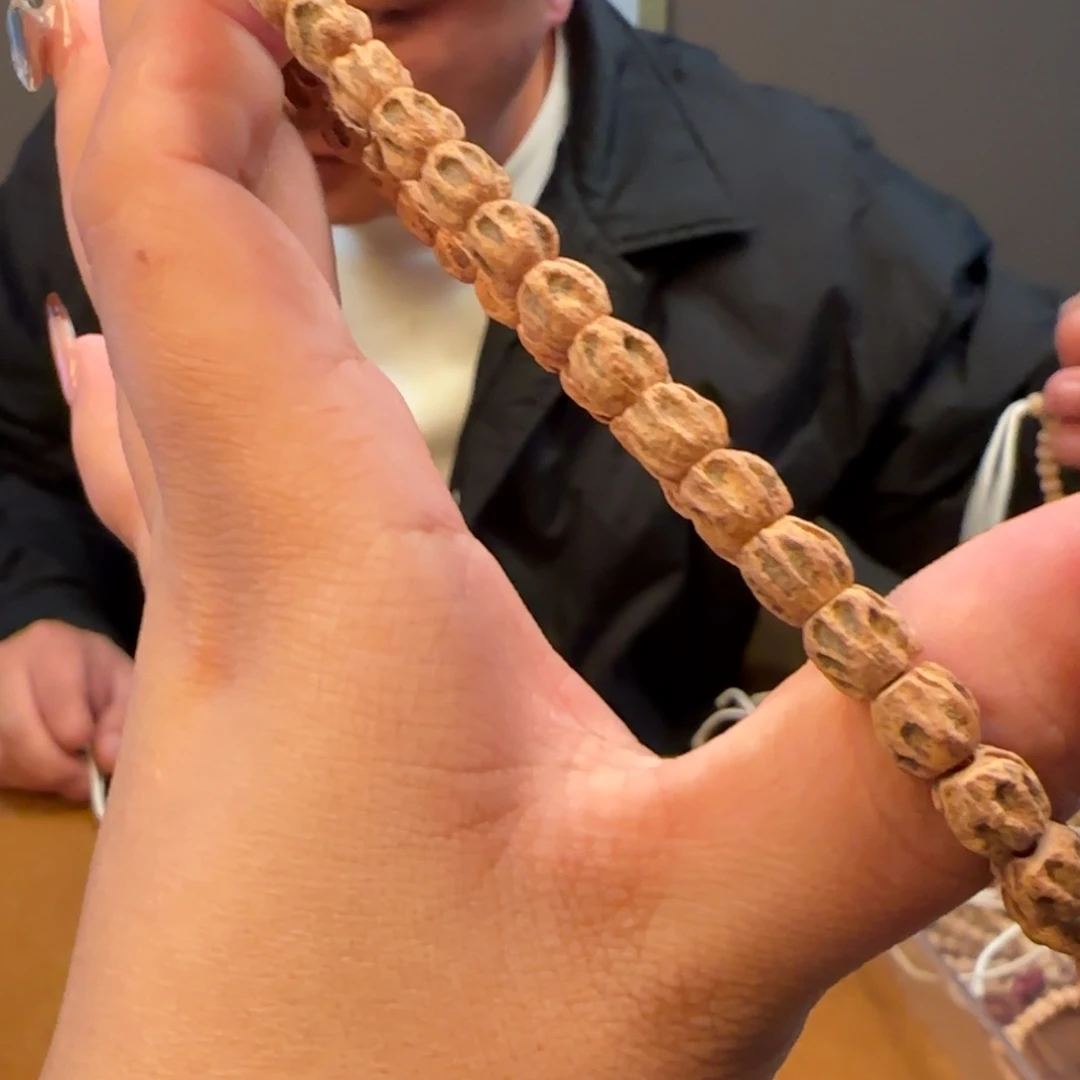 柏香籽/百香籽手串d****c手持