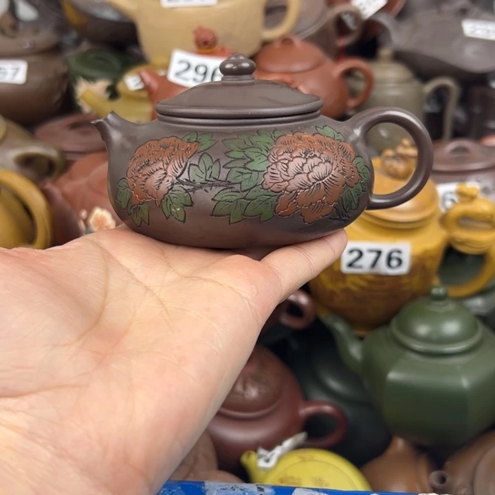 茶壶紫砂壶嘴磕的