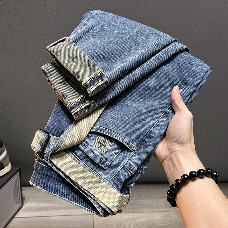 春夏薄款潮牌牛仔裤男士时尚印花九分休闲长裤潮流修身小脚裤835