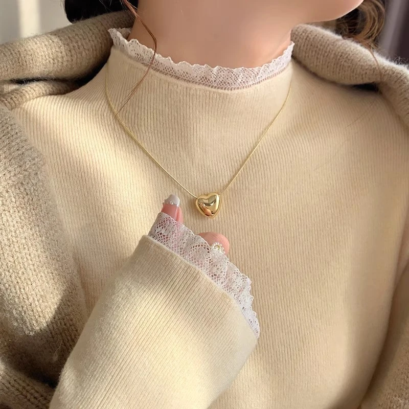 黄色蕾丝半高领针织衫女内搭2025新款中领毛衣设计感长袖打底上衣