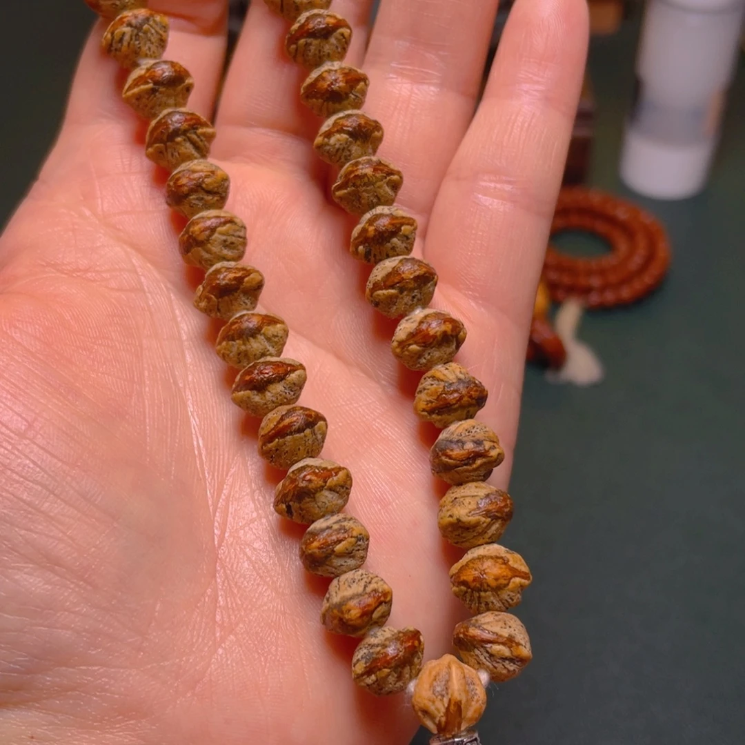 君***荼柏香籽/百香籽吊坠红牙横打手持最后一条