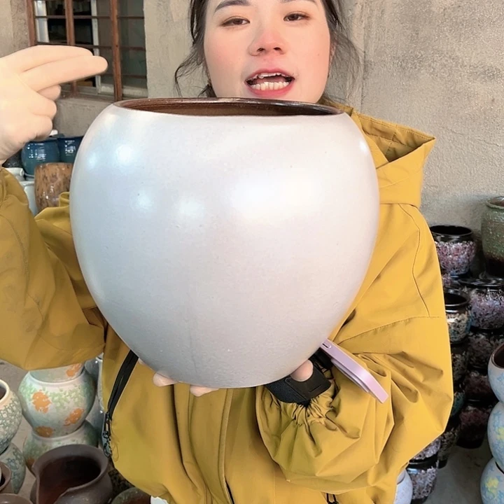 瑕疵口19高23花盆……