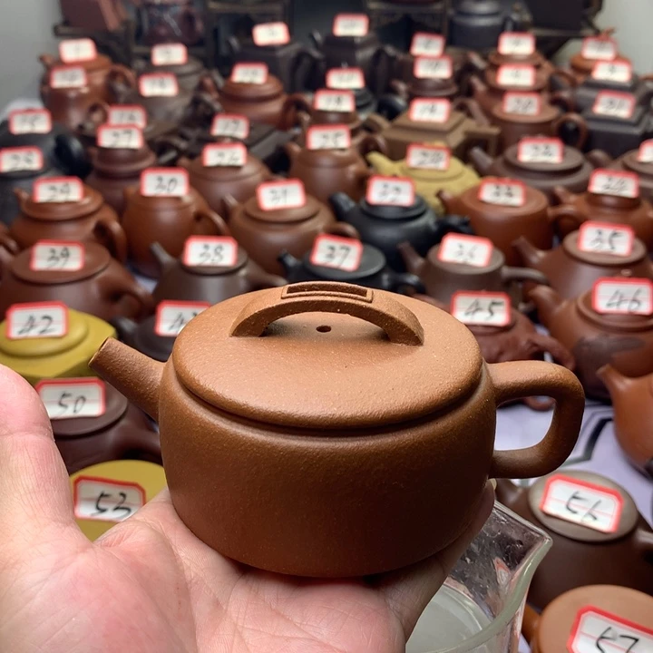 紫砂茶壶落**海微瑕晃盖