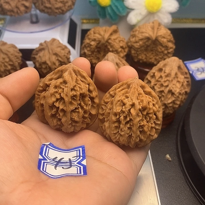 钱***量把件文玩核桃38状元冠