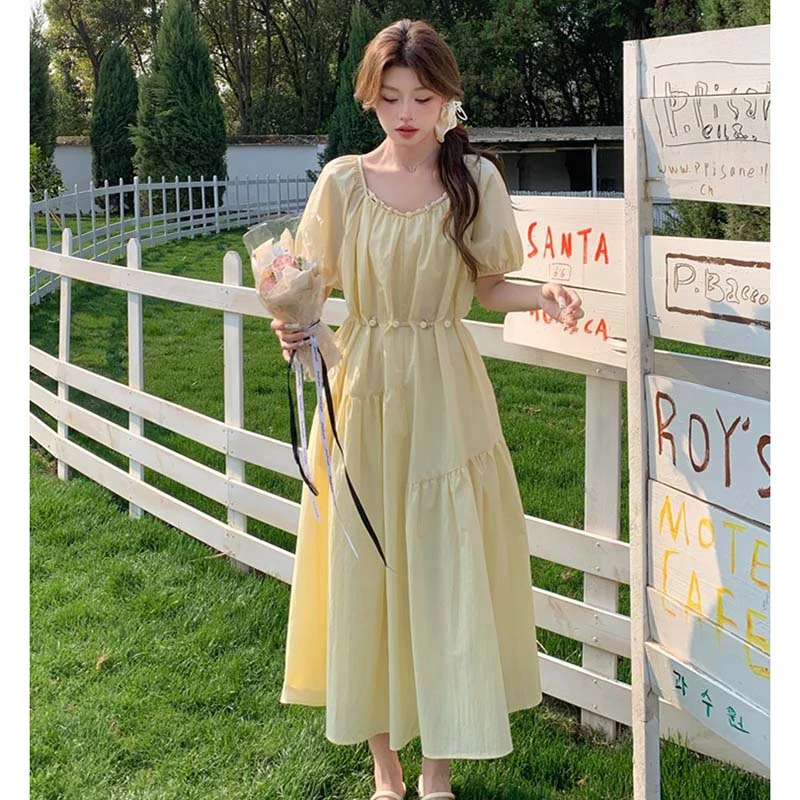 2025款法式气质收腰显瘦泡泡袖奶黄色连衣裙女夏长裙D1959