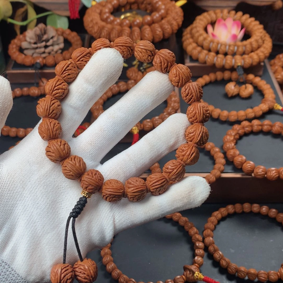 桃核吊坠14元宝刺龙手持