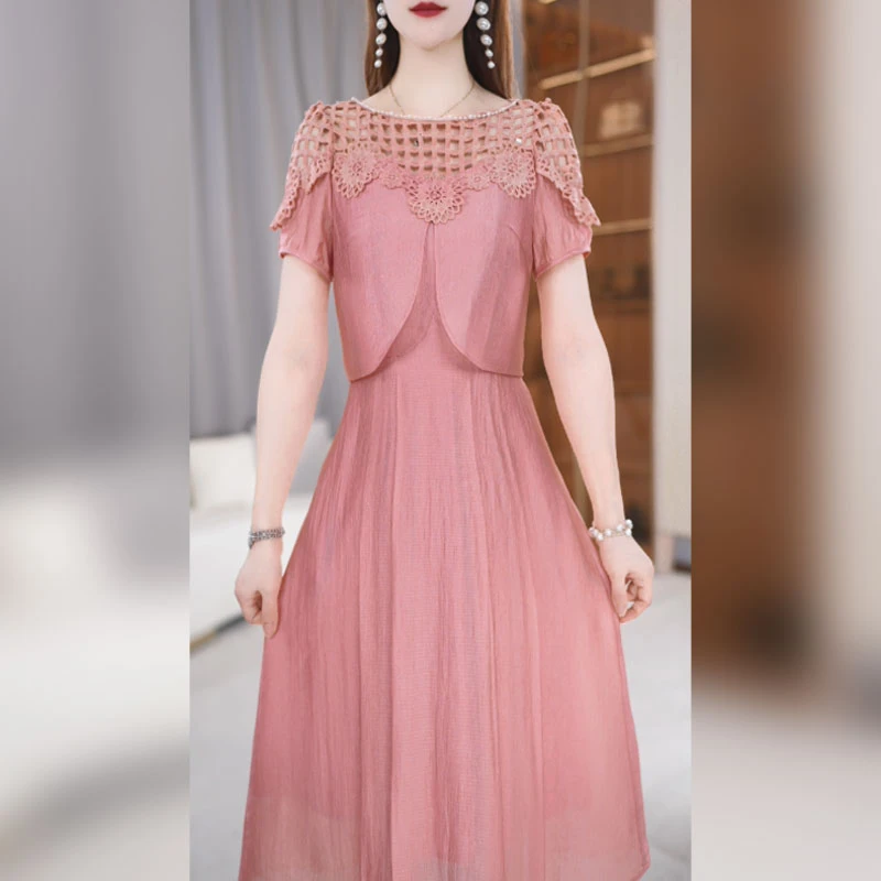 玖慕镂空拼接粉色连衣裙女夏季2025新款减龄穿搭设计感中长a字裙