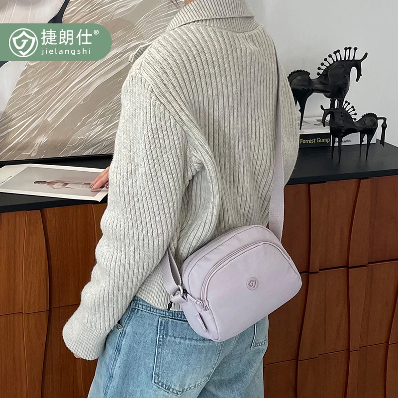 百搭斜挎小包包女2025新款多层单肩包牛津布时尚高级感帆布小包包