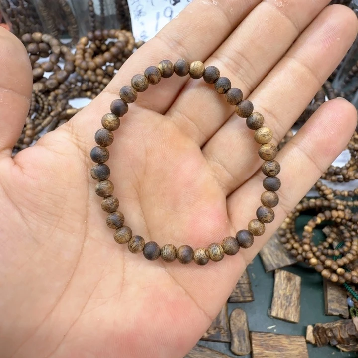 沉香沉香碎屑奇楠沉香乌身卡0.5单圈虫漏珠2克+