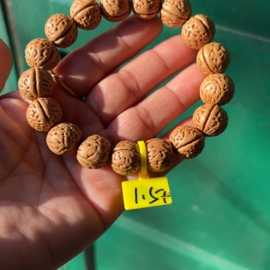 木质野生桃核手串